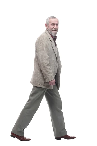 In full growth. confident old man striding forward . — Stock Photo, Image