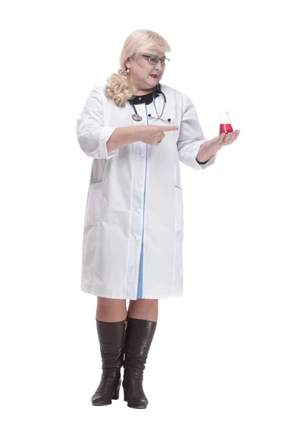 In full growth. attending doctor with a laboratory flask. — Stock Photo, Image