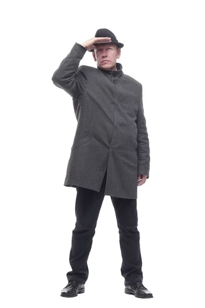 Un hombre inteligente con sombrero y abrigo de otoño. aislado sobre un fondo blanco. —  Fotos de Stock