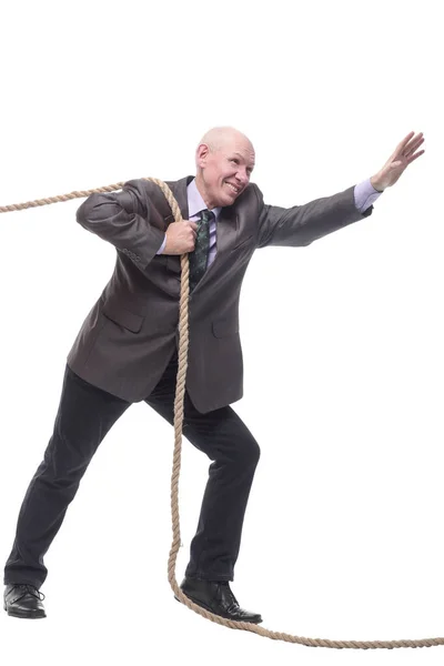 Business man pulls a rope. isolated on a white — Stock Photo, Image