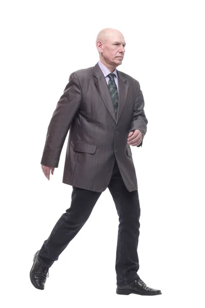 Executive business man striding forward . isolated on a white — Stockfoto
