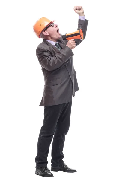 Hombre de negocios en un casco protector con un megáfono. — Foto de Stock