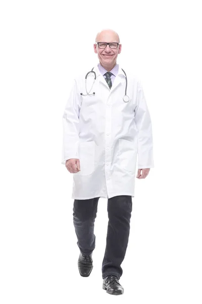 Male doctor with a stethoscope striding forward. — Stock Photo, Image