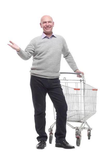 En pleno crecimiento. un hombre feliz con un carrito de compras. — Foto de Stock