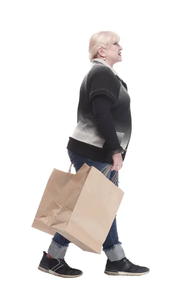 Повну довжину. випадкова жінка в джинсах з сумками . — стокове фото