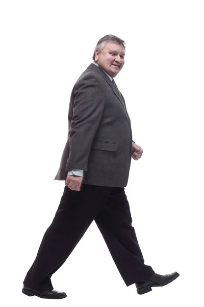 Business man confidently striding forward . isolated on a white — Foto Stock