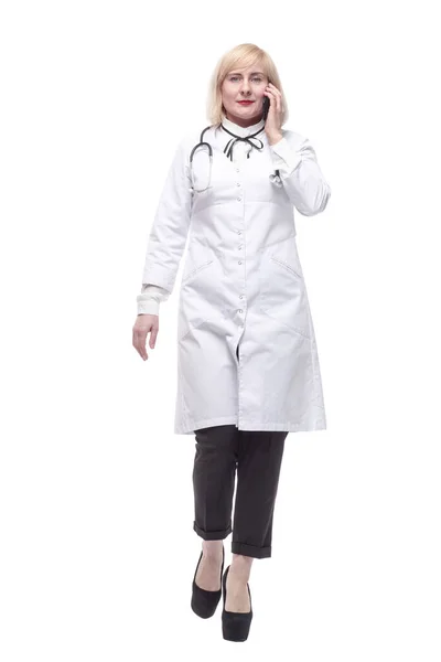 Qualified female doctor with a smartphone in her hands. — 图库照片