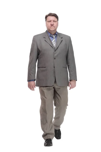 Full-length. casual man in a grey jacket striding forward. — Stockfoto