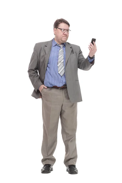 En pleno crecimiento. hombre de negocios serio con un teléfono inteligente. —  Fotos de Stock