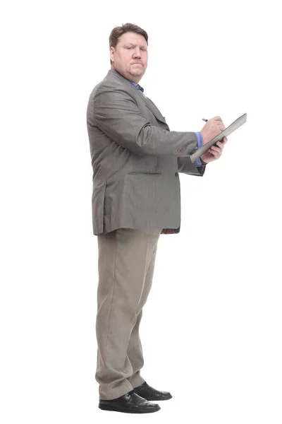 In full growth. serious business man with a clipboard. — Stockfoto