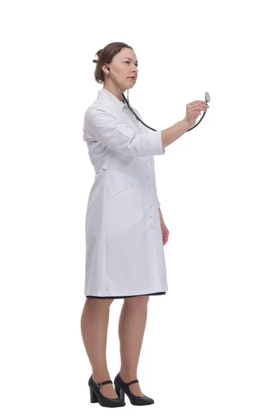 In full growth.a female doctor with a stethoscope in her hand — Stockfoto