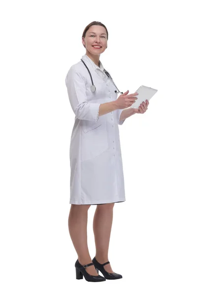 In full growth.female doctor with a digital tablet. — Stockfoto