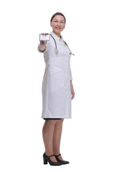 In full growth.medical doctor woman showing her visiting card. — Stockfoto