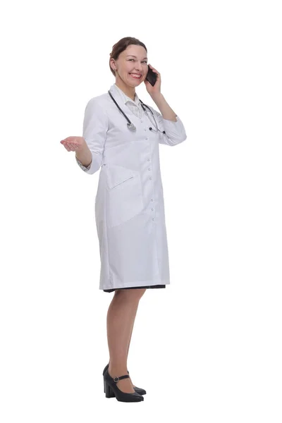 In full growth.female doctor with a smartphone. — 图库照片