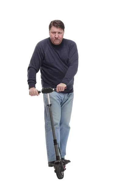Volledige lengte. volwassen man met een elektrische scooter. — Stockfoto