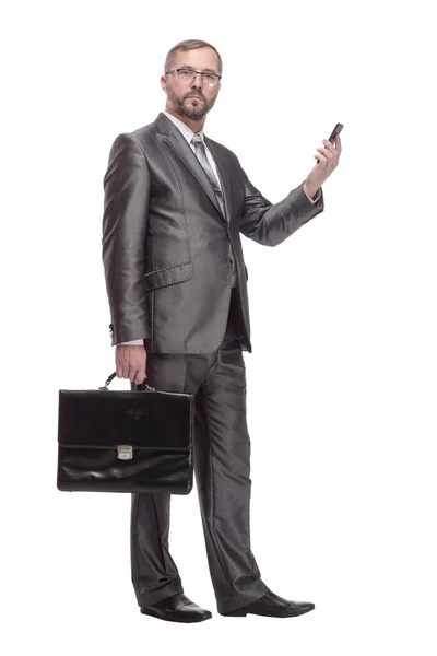 Executive zakenman met een smartphone. geïsoleerd op een witte achtergrond. — Stockfoto