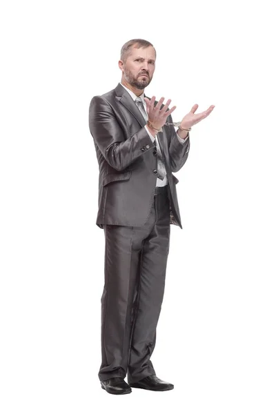 Businessman in handcuffs. isolated on a white background. — Stockfoto