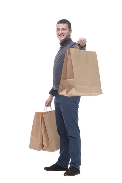 In full growth. casual young man with shopping bags. — Stockfoto