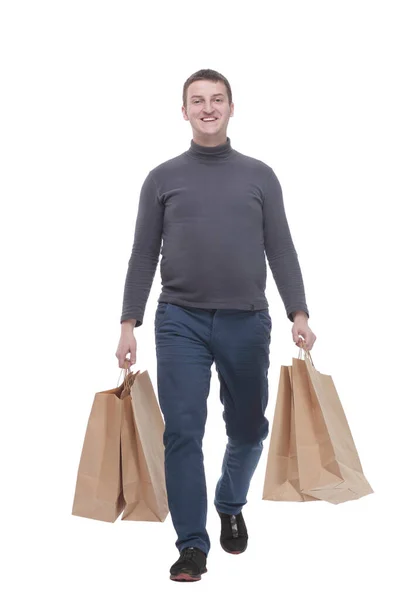 En pleine croissance. jeune homme occasionnel avec des sacs à provisions. — Photo