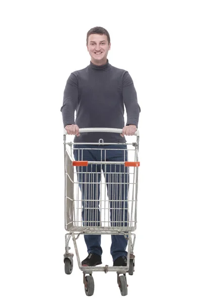 In full growth. casual young man with shopping cart. — Stockfoto