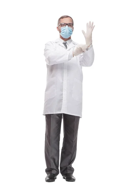 Medic in beschermend masker en handschoenen. geïsoleerd op een witte achtergrond. — Stockfoto