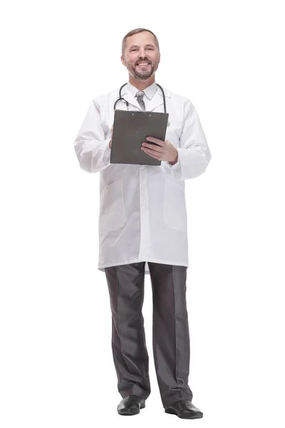 Smiling doctor with clipboard . isolated on a white background. — Stockfoto