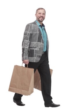 Tam gelişim. Alışveriş torbalı mutlu adam..