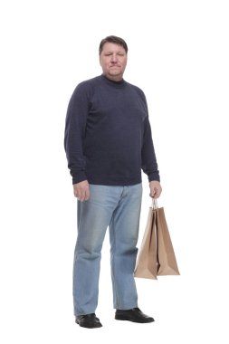 Tam gelişim. Alışveriş çantalı olgun bir adam..