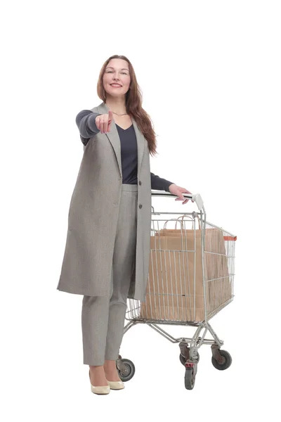 In full growth. elegant woman with a shopping cart. — Stock Photo, Image