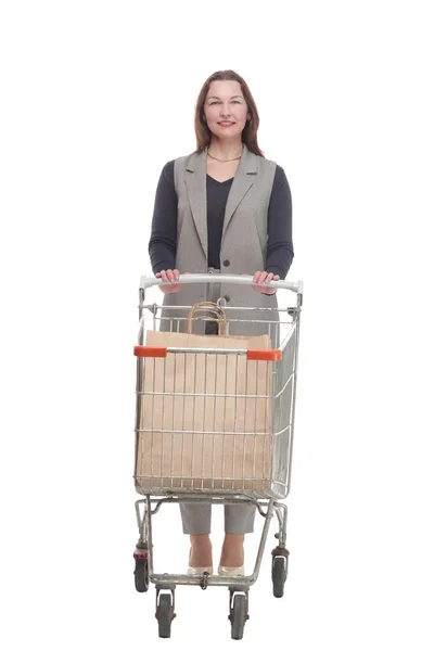 In full growth. elegant woman with a shopping cart. — Stock Photo, Image