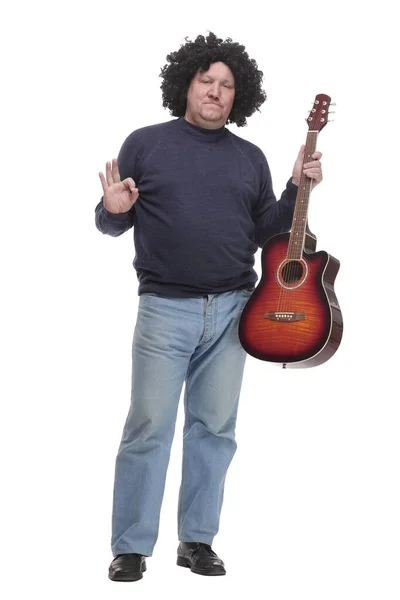 Em pleno crescimento. cabelo encaracolado homem maduro com uma guitarra. — Fotografia de Stock