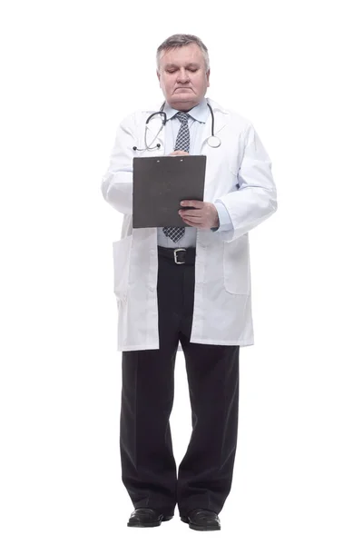 Competent doctor with clipboard. isolated on a white background. — 图库照片