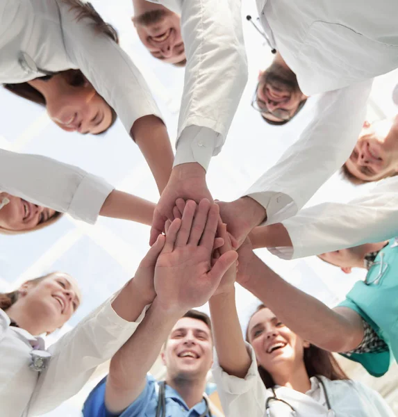Bottom view. diverse medical professionals showing their unity. — Stock Photo, Image