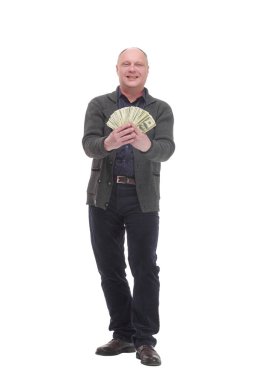 happy casual man with dollar bills .isolated on a white background.