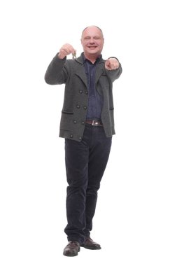 smiling mature man with keys in hand.
