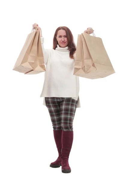 Mujer casual con bolsas de compras .isolated sobre un fondo blanco. — Foto de Stock