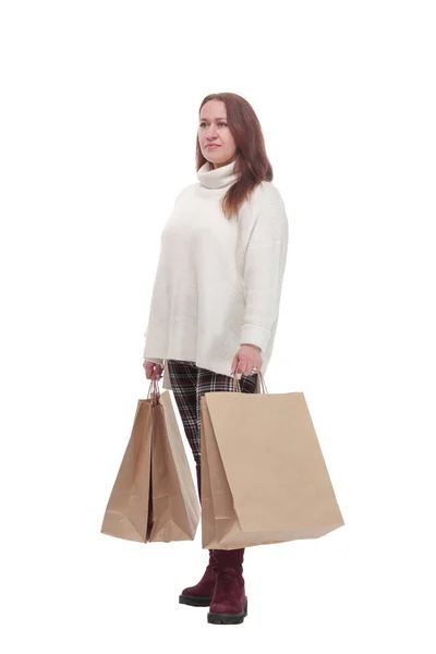 Alışveriş torbalı sıradan bir kadın. Beyaz bir arka planda izole edilmiş.. — Stok fotoğraf