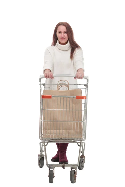 Casual woman with shopping cart .isolated on a white background. — Stock Photo, Image