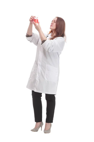 Mature female doctor with a laboratory flask. — Φωτογραφία Αρχείου