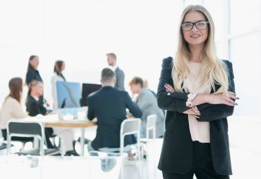 young business woman on the background of a modern office