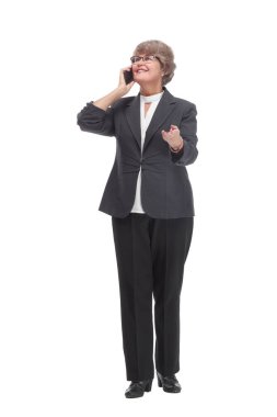 Front view of middle age professional businesswoman using her smartphone