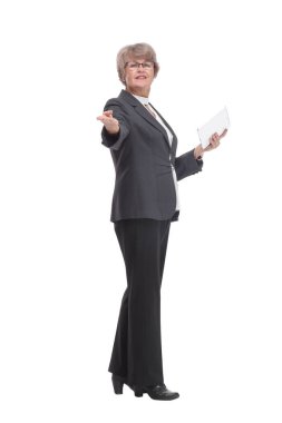 Happy mature woman pointing at camera with tablet pc on white background