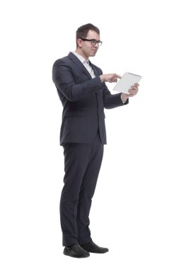 Side view portrait of curious and smiling businessman with tablet looking and pointing to side
