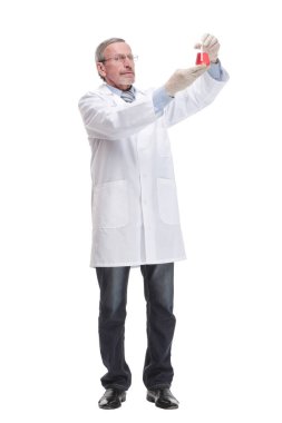 Portrait of a doctor wearing glasses and rubber gloves holding laboratory glassware beaker with red liquid substance