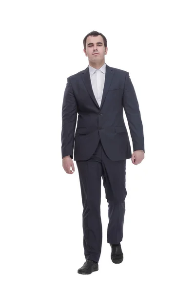 Happy businessman in black suit walking in front of the camera — Stock Photo, Image