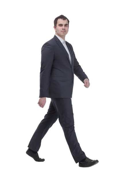 Happy businessman in black suit walking in front of the camera — Stock Fotó