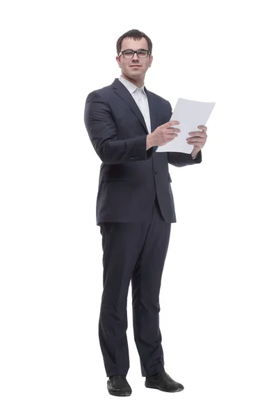 Business man in glasses and formalwear is readin a document while standing against a white background — Stock fotografie