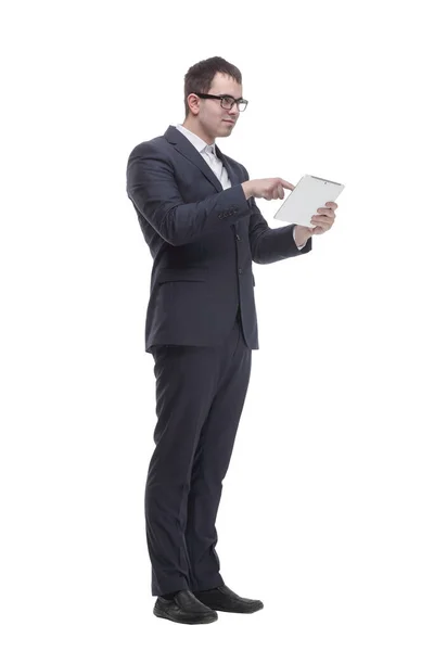 Side view portrait of curious and smiling businessman with tablet looking and pointing to side — Stock Photo, Image