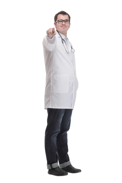 Smiling young male doctor with stethoscope over neck in medical coat — Stock Photo, Image