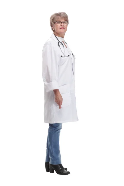 Portrait of a female doctor wearing stethoscope and uniform, pointing her finger up — Stockfoto